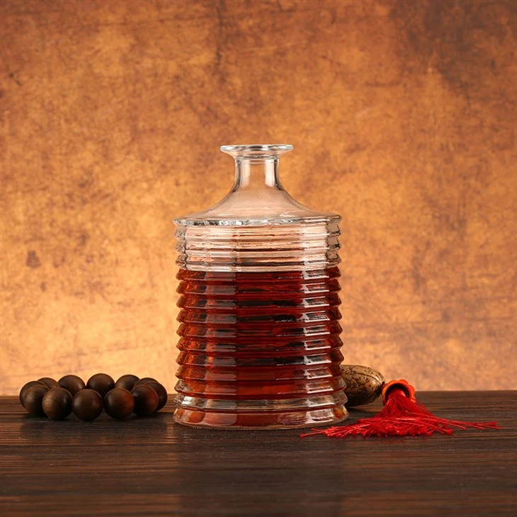 China Supplier Unique Design Round Glass Bottle 500ML